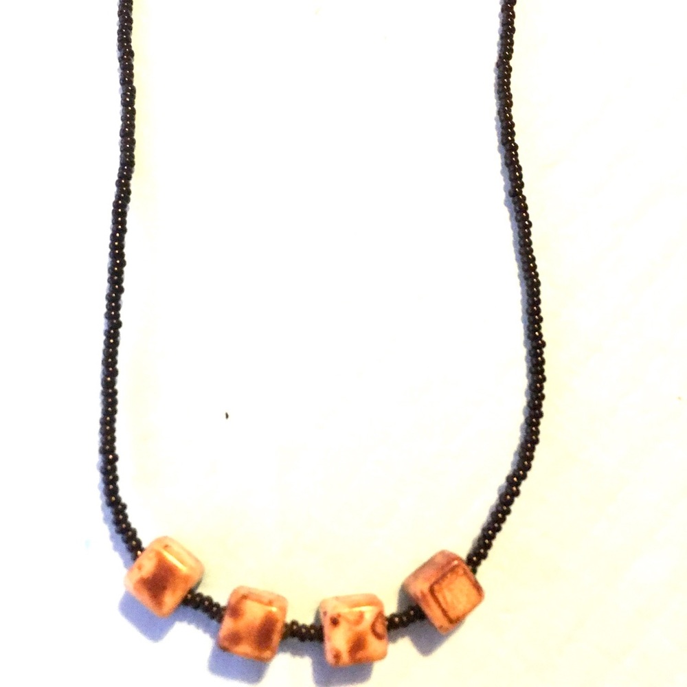 Brown and beige beaded necklace with black beads